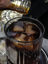 Close-up of ice cream in glass on table