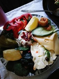 High angle view of fruits in plate on table