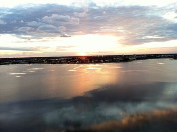 Scenic view of sea against sky at sunset