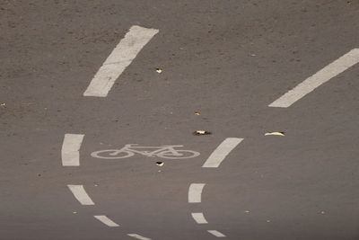 Arrow sign on road