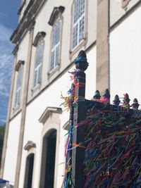 Low angle view of statue against building