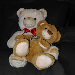 Close-up of decoration hanging against black background