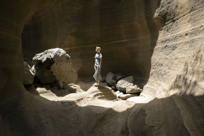 Tourist on vacation at grand canary, barranco de las vacas, spain