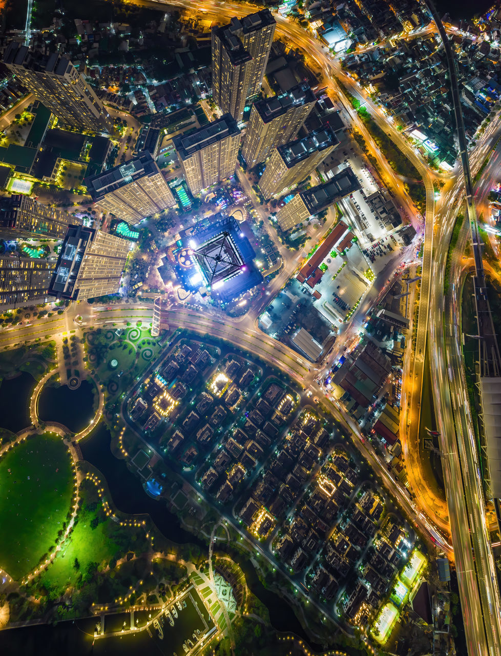 HIGH ANGLE VIEW OF ILLUMINATED CITY STREET