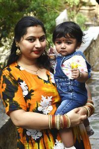 Portrait of mother and girl