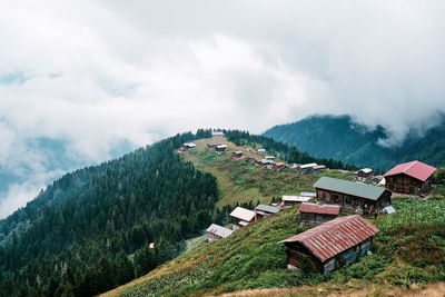 Scenic view of residential buildings against sky