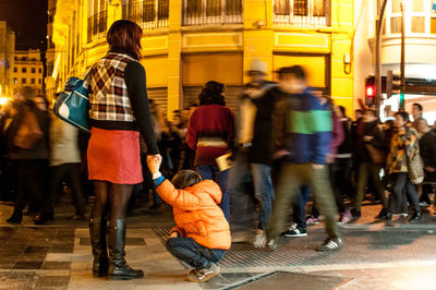 People standing on city street