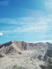 Scenic view of desert against sky