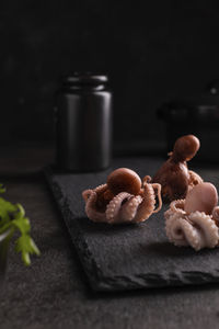 Close-up of chocolate cake on table against black background