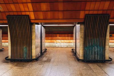 Interior of illuminated subway station