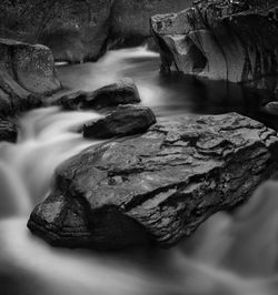 Close-up of rocks in water