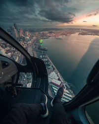 Aerial view of cityscape seen through airplane window