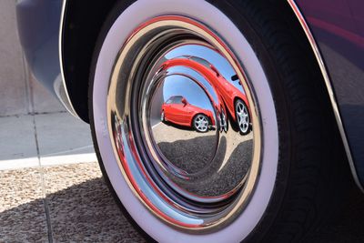 Close-up of vintage car on road