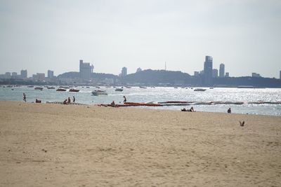 View of beach with buildings in background