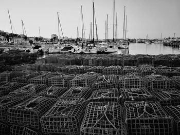 Lobster traps and boats at harbor