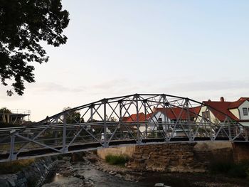 View of bridge over river against sky