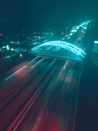 High angle view of light trails on multiple lane highway