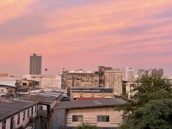 High angle view of buildings against sky during sunset