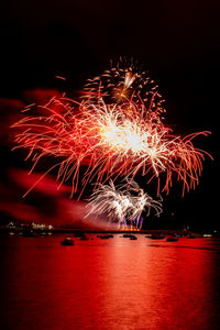 Firework display at night