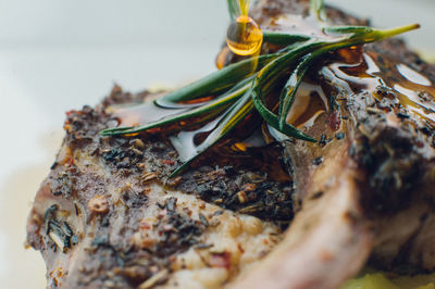 Close-up of roasted lamb chops in plate