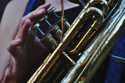Cropped image of man playing trumpet