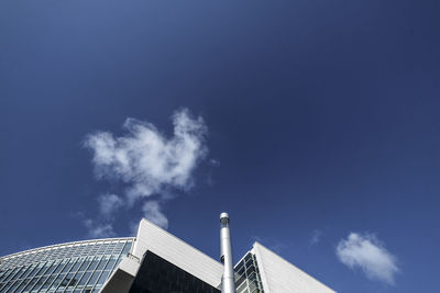 Low angle view of building against blue sky