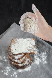 Close-up of hand holding bread