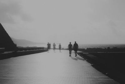 People standing on beach