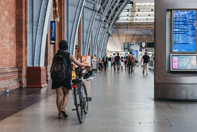 People on bicycle in city