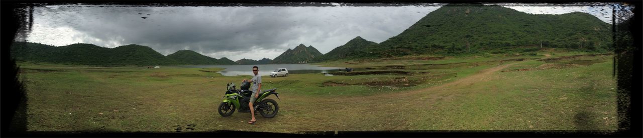 transfer print, sky, auto post production filter, transportation, mode of transport, bicycle, cloud - sky, water, tranquility, tranquil scene, scenics, nature, mountain, land vehicle, beauty in nature, beach, cloudy, sand, cloud, sea