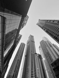 Low angle view of modern buildings against clear sky