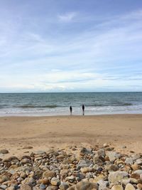 Scenic view of beach against sky