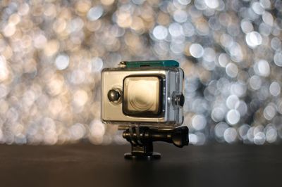 Close-up of camera on table