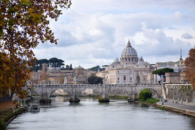 Basilica di san pietro, st. peter basilica in rome taken from tevere river. iconic view of rome