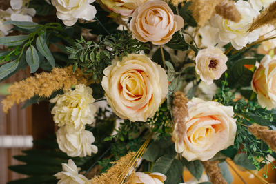 Beautiful background of roses and dried flowers close-up