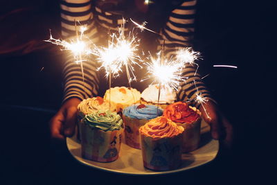 Close-up of sparkles on cup cakes