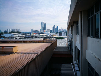 Modern buildings against sky in city