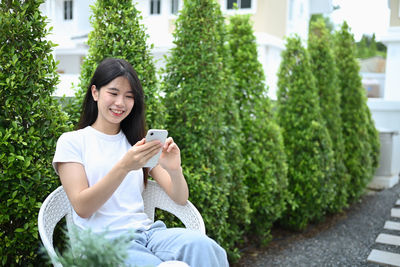 Young woman using mobile phone