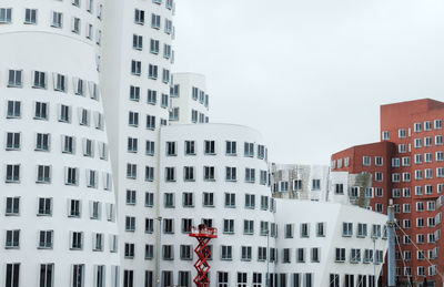 Low angle view of buildings against clear sky