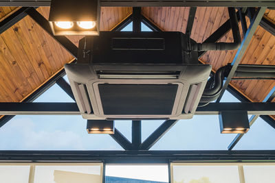 Low angle view of illuminated ceiling of building