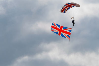 Low angle view of flag against sky