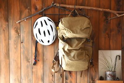 Close-up of hat hanging on wall