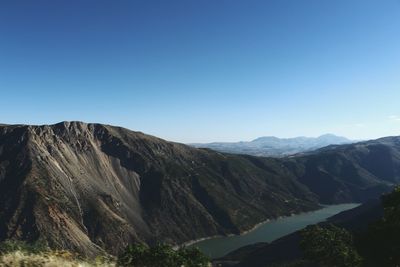 Scenic view of mountains against clear blue sky at firat river 