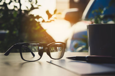 Close-up of sunglasses on table