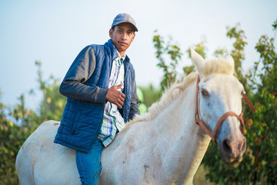 Man riding horse