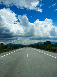 View of road against cloudy sky
