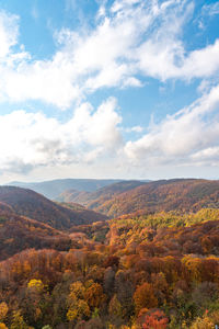 Scenic view of landscape against sky during autumn