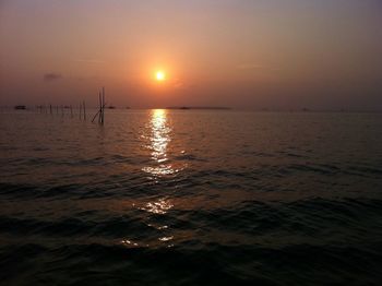 Scenic view of sea at sunset