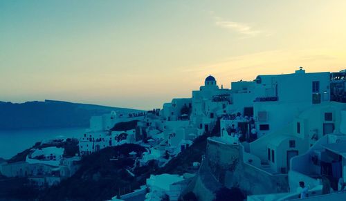 High angle view of town against sky during sunset