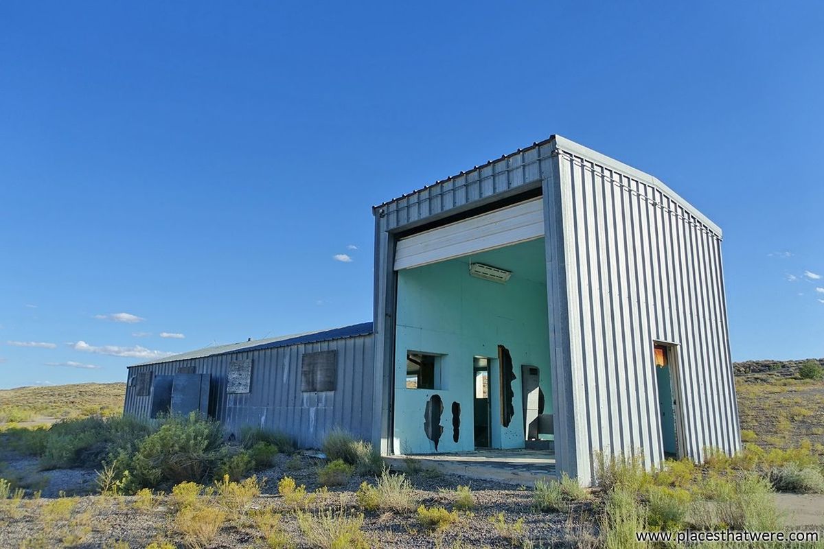 blue, built structure, building exterior, outdoors, clear sky, sunlight, architecture, no people, day, sky, nature, grass